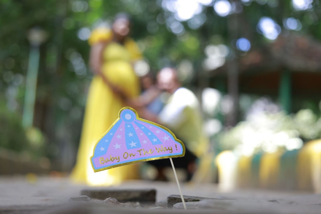 Baby on the way announcement sign from a maternity session